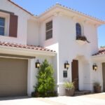 Enhance Your Home’s Curb Appeal and Choose The Garage Door Colors for Beige House